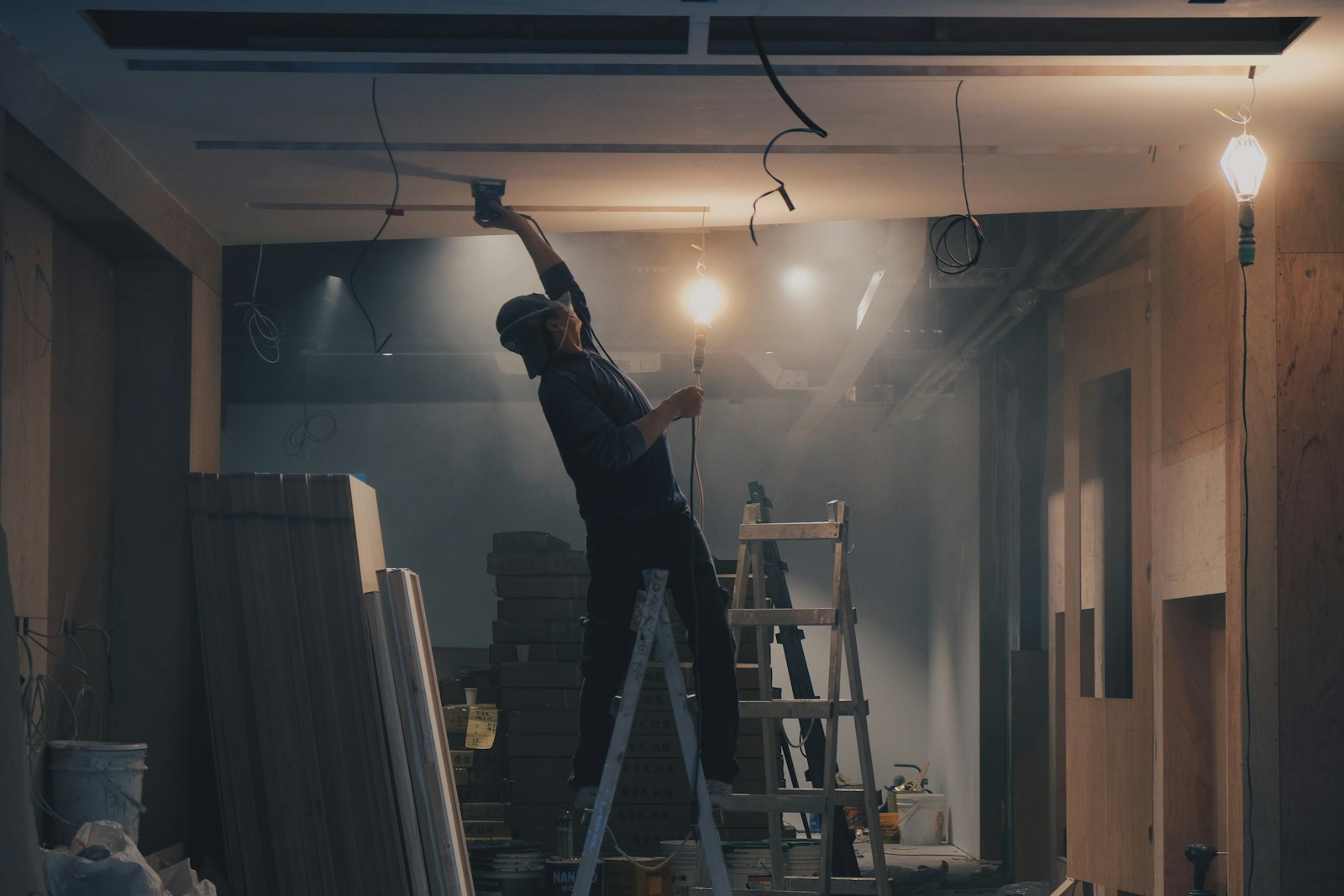 man on white ladder, workers